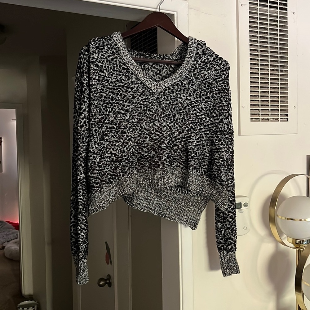Size S, loose knit, cropped with hoodie sweater.